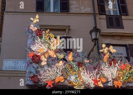 Christmas lights illuminate the shopping streets in the city center of Rome, in the year that the Jubilee begins. Rome, Italy, Europe, European Union Stock Photo