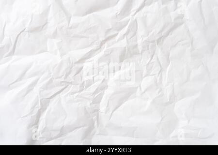 Top view and full frame of wrinkled or crumpled white stencil paper texture is used for wrinkled or crumpled white paper background texture Stock Photo