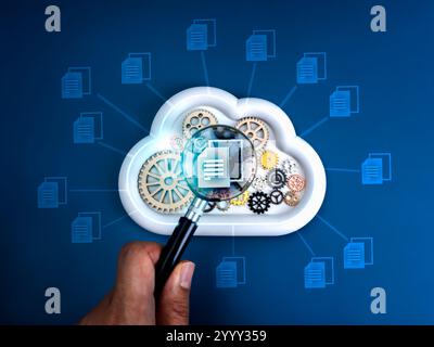 Cloud storage, data searching and transfer, migration service, backup files and document concept. Correct file icon in magnifying glass in hand on gea Stock Photo