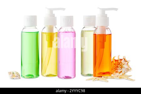 Assorted skincare products displayed on a white surface with a seashell Stock Photo