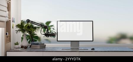 A modern, simple office workspace featuring a computer with a white desktop mockup, a microphone, and stylish decor on a desk by the window. home podc Stock Photo