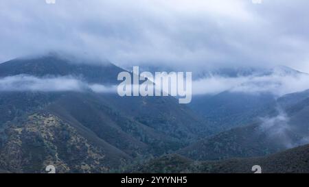 Dramatic Winter Views of Rolling Landscape and Low Clouds via Black Point Mountain. Mt. Diablo State Park, Contra Costa County, California. Stock Photo