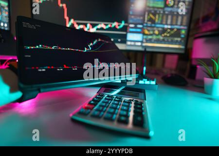 graphic tablet cryptu currency stock bars calculator financial exchange home studio equipment neon lights Stock Photo
