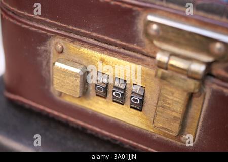 Vintage leather suitcase combination lock close-up Stock Photo