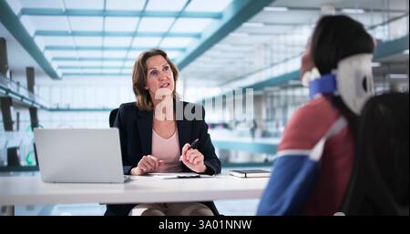 Compensating injured workers through disability claims and social security. Stock Photo