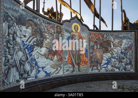 SAMOLVA, RUSSIA - OCTOBER 16, 2024: Saint Prince Alexander Nevsky and fragments of the Ice Battle. Mosaic panel at the Chudskoe Lake, Pskov region Stock Photo