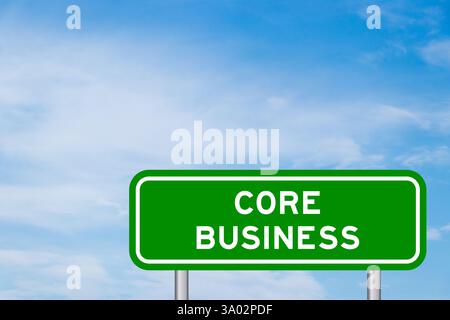 Green color transportation sign with word core business on blue sky with white cloud background Stock Photo