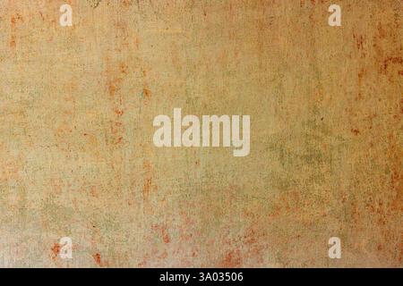 shabby washed out whitewash on orange wall texture and background Stock Photo