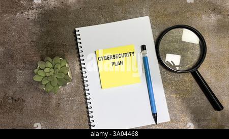 Concept of Cybersecurity Plan write on sticky notes isolated on Wooden Table. Stock Photo