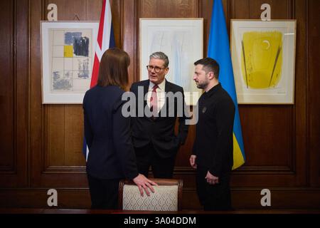 London, United Kingdom. 01st Mar, 2025. Ukrainian President Volodymyr Zelenskyy, right, and British Prime Minister Keir Starmer, center, chat with U.K Chancellor of the Exchequer Rachel Reeves, left, before the signing of loan guarantees for Ukraine at #10 Downing Street, March 1, 2025 in London, United Kingdom. Credit: Pool Photo/Ukrainian Presidential Press Office/Alamy Live News Stock Photo