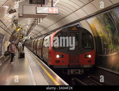 London Underground 1995 stock Northern line train at Angel station with waiting passengers Stock Photo