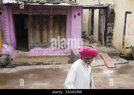 Old man walking on street Nandur, Marathwada, Maharashtra, India NOMR Stock Photo