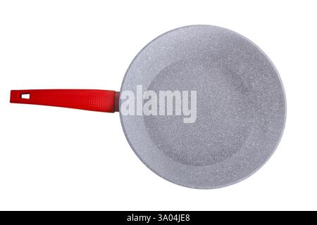 Deep red frying pan with non-stick coating isolate on white background close-up Stock Photo