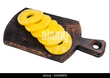 Canned Pineapple rings slices on a board isolated on white background. top view. Stock Photo