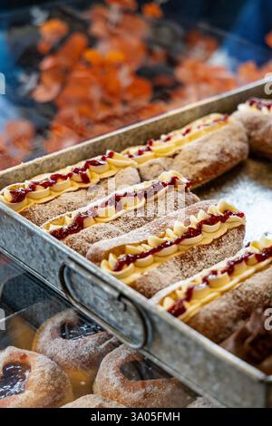 Split donuts at Greedy Cow Bakes, Hackney, London, England Stock Photo