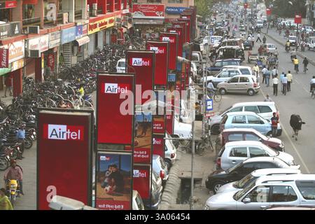 Busy street with hoardings of Airtel phone company in Ranchi city capital of Jharkhand, India, Asia Stock Photo