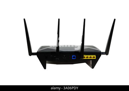 Generic internet wireless router rear view with four antennas against a white background. Stock Photo