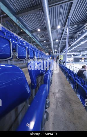Empty blue rows of seats in a modern sports hall with industrial design, Heilbronner Falken Vs Bietigheimer Steelers, Heilbronn, Germany, Europe Stock Photo