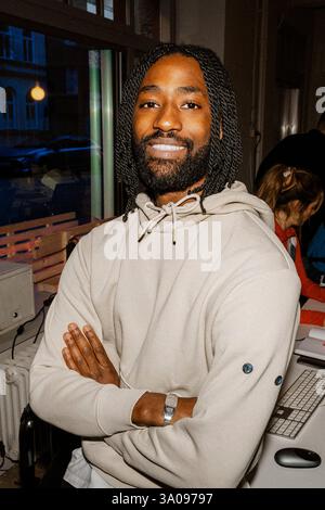 Portrait of confident male business professional with arms crossed at office Stock Photo