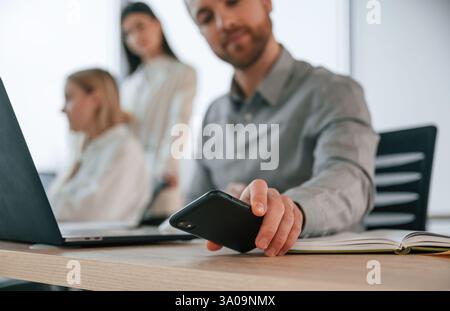 Working on a project together. Successful team are in the office. Conception of business. Stock Photo