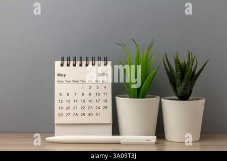 Hello May. May 2025 planning calendar on gray background Stock Photo