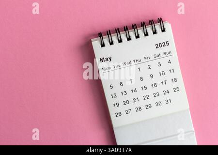 Hello, May. The planning calendar for May 2025 on a pink background Stock Photo