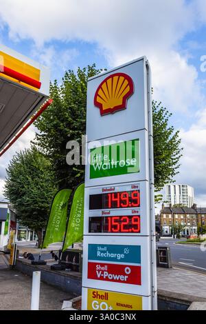 Modern Fuel Prices Display at a Shell Station in London with High-Rise ...