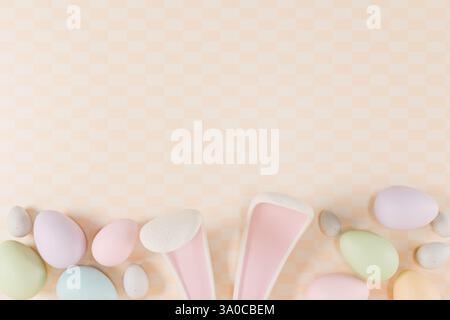 Easter themed image featuring pastel eggs and bunny ears against a soft background. 3d rendering Stock Photo