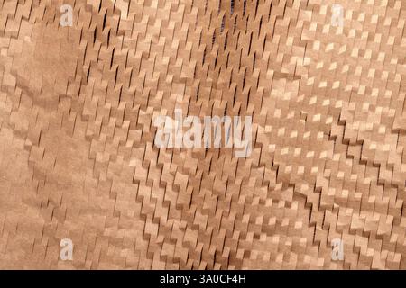 Eco friendly brown honeycomb paper texture. Packaging soft material used to wrap or protect goods. Top view. Abstract textured background Stock Photo