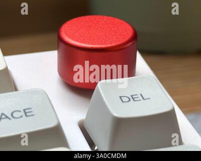 The big red macro button on a mechanical keyboard is responsible for launching various functions and adjusting the volume Stock Photo
