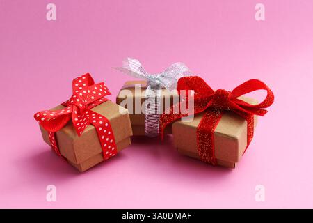 Three gift boxes with different bows Stock Photo
