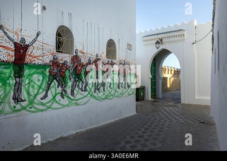 The fortified town of Asilah, with its fully intact ramparts and gateworks, is located on the northwest tip of Morocco's Atlantic coast. Stock Photo