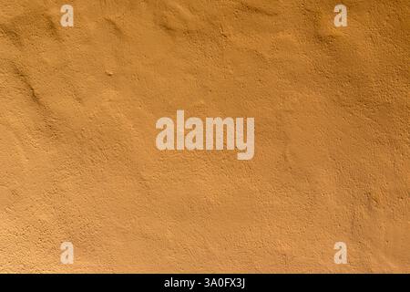 Background texture of wall with yellow stucco or concrete in spain Stock Photo