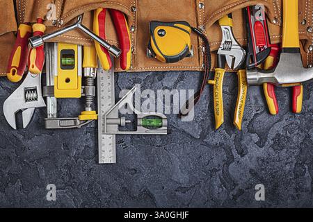 Construction Toolbelt With Different Tools On Black Background Stock Photo