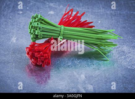 Cable ties on metallic background construction concept Stock Photo