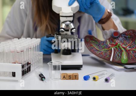 Engaging in comprehensive Laboratory Research utilizing Microscope with Sample Analysis techniques Stock Photo