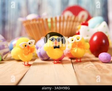 Easter decoration. small yellow chicks with glasses Stock Photo