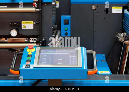 Touchscreen control panel of modern industrial equipment. Selective focus. Stock Photo