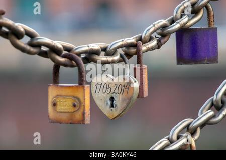 Love Locks on Chain Bridge with Heart-Shaped Padlock Stock Photo