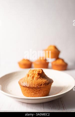 homemade lemon muffins on off white background Stock Photo