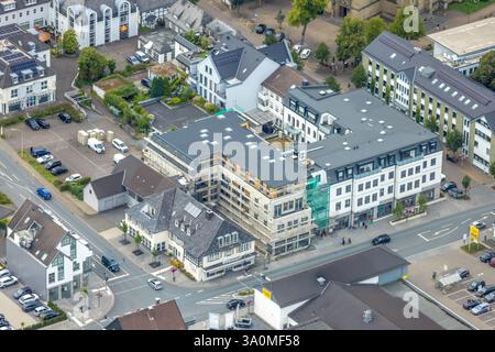 Aerial view,, Construction site in the town center with new residential building on the main street, Warstein, Sauerland, North Rhine-Westphalia, Germ Stock Photo