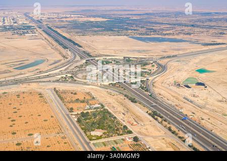 Aerial top-down view of highway in desert in Abu Dhabi Stock Photo