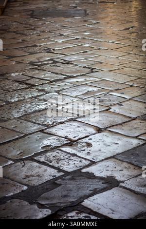 Paving stones texture on ancient road Stock Photo