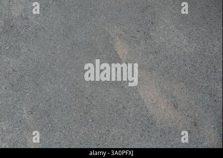 Gray asphalt texture. Surface of gray asphalt path with sun light. Gray asphalt for backgrounds Stock Photo