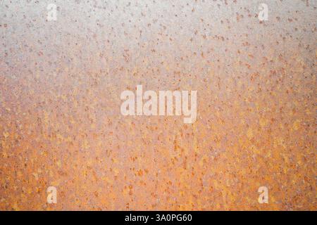 Rusty metallic surface as a background. Close-up of rust. Stock Photo