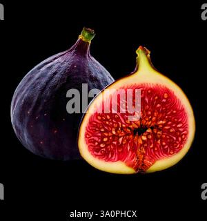 Fig,Fresh Whole and Half-Cut Fig on Black Background Stock Photo