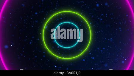 Image of neon circles moving over blue spots Stock Photo