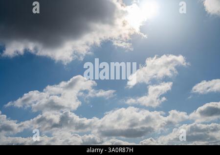 Blue 'Simpsons Sky' - clear blue sky with white fluffy clouds Stock Photo