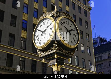 Manhattan, New York City, New York, USA, North America, Two tower clocks show different times on a nostalgic building in front of a blue sky, North Am Stock Photo