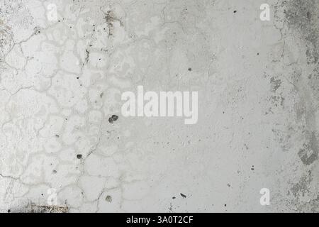 Gray-white wall with imperfections whose surface needs to be repaired Stock Photo